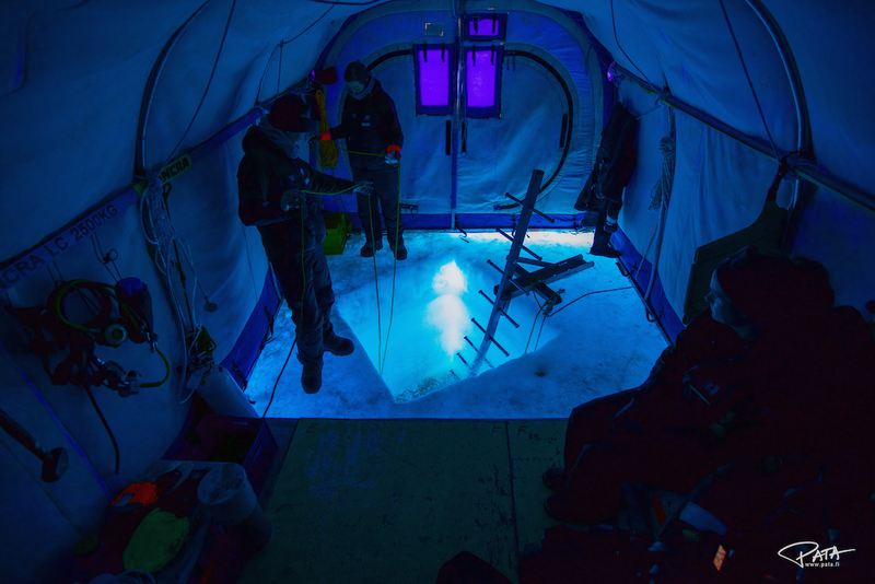 A hole drilled in the Antarctic sea ice by the Science Under the Ice expedition. Photo Courtesy Patrick Degerman